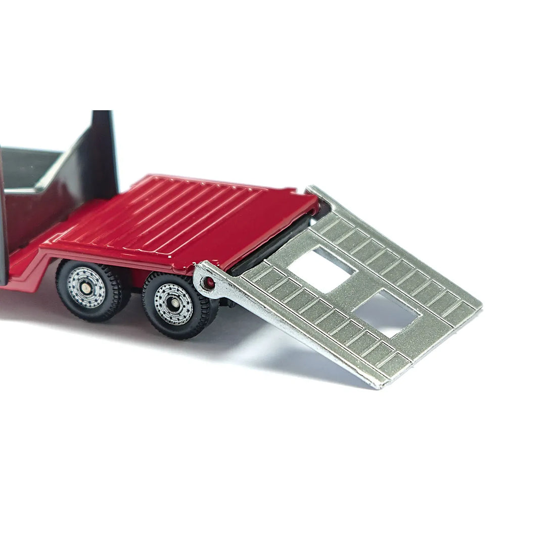 A close up of the Siku 1613 red toy truck's opening flatbed ramp.