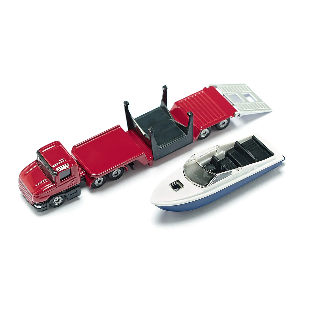 Looking down on a Siku 1613 red toy truck, sitting next to a blue & white boat.  Available from Toys101.